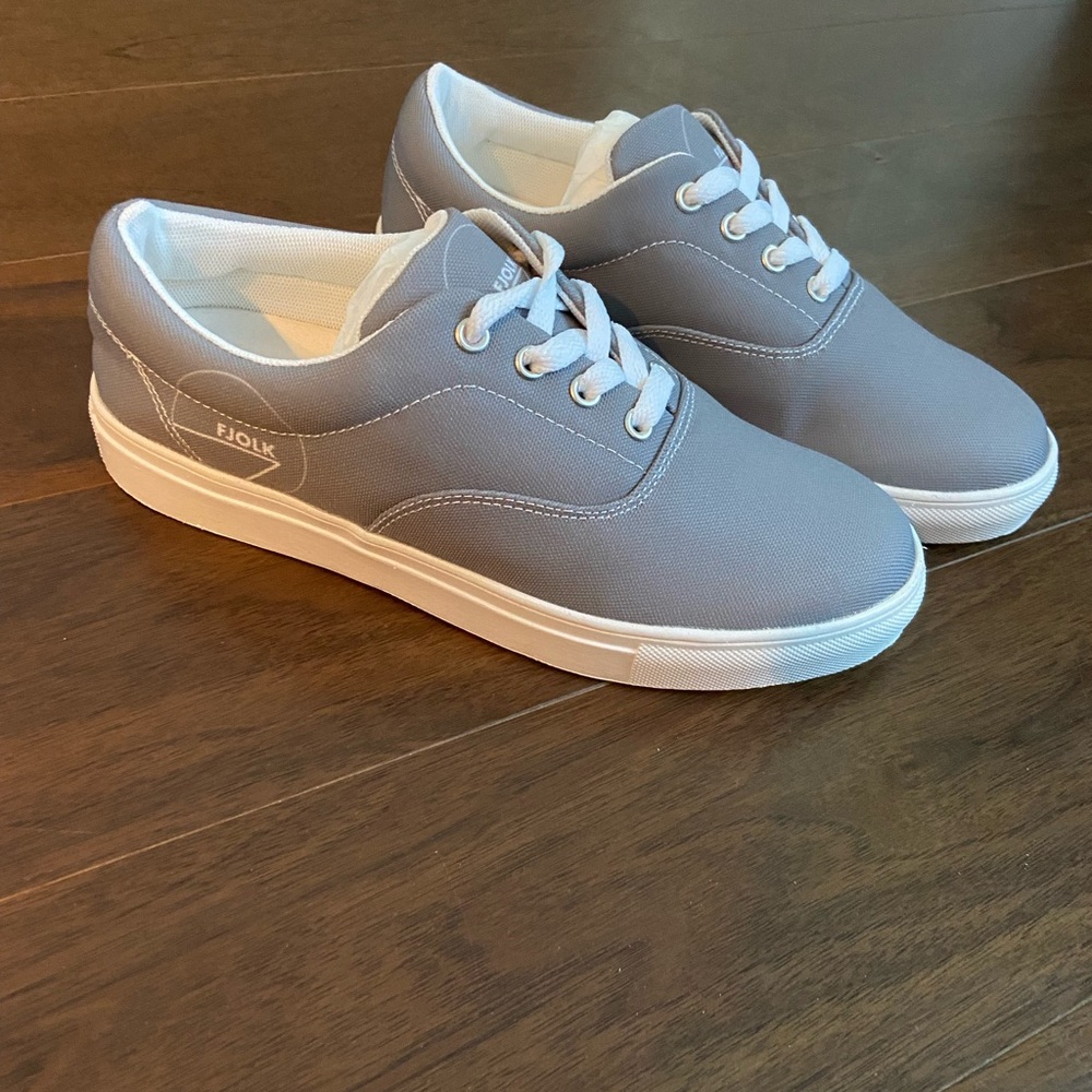Fjolk brand new sneakers. Size 7. Never worn, still in original box.